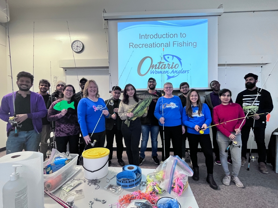 DMC students participating in the workshop holding fishing rods